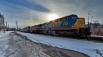 CSX 551 with ever so slight a Sun Dog above the second unit.